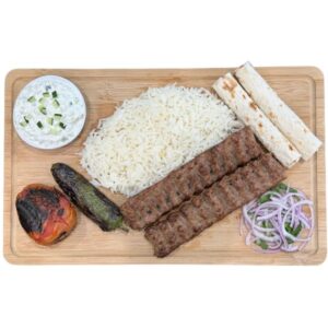 Beef lula kabob plate with rice and grilled vegetables